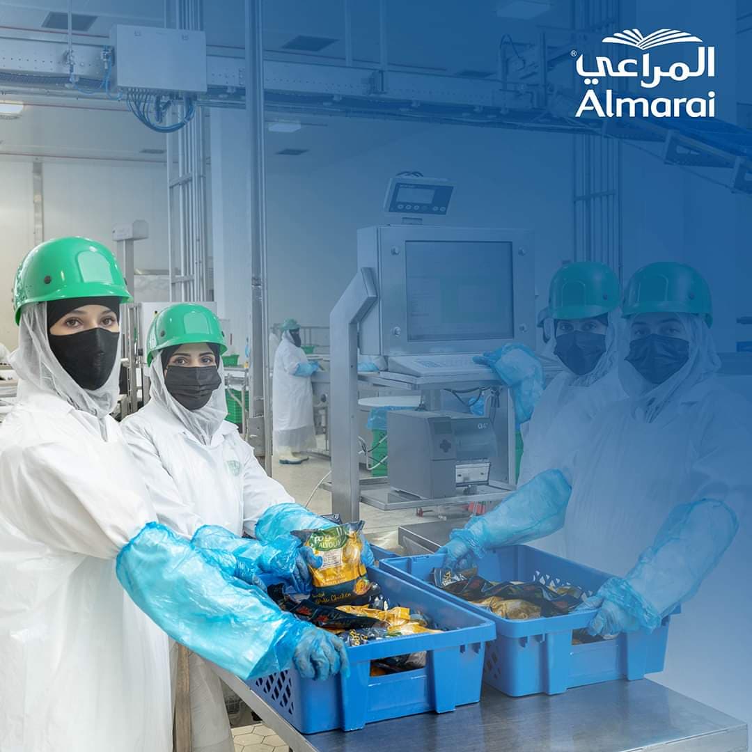 Scientists conducting careful laboratory work